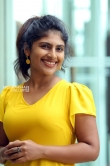 Ambily Nair in yellow dress stills (28)