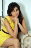 harshika-poonacha-in-yellow-dress-during-her-interview-48556