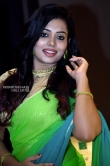 Remya Panicker in green saree stills (6)