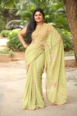 Anchor Sonia Chowdary in green saree stills (12)