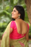Anchor Sonia Chowdary in green saree stills (15)