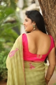 Anchor Sonia Chowdary in green saree stills (16)