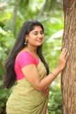 Anchor Sonia Chowdary in green saree stills (3)